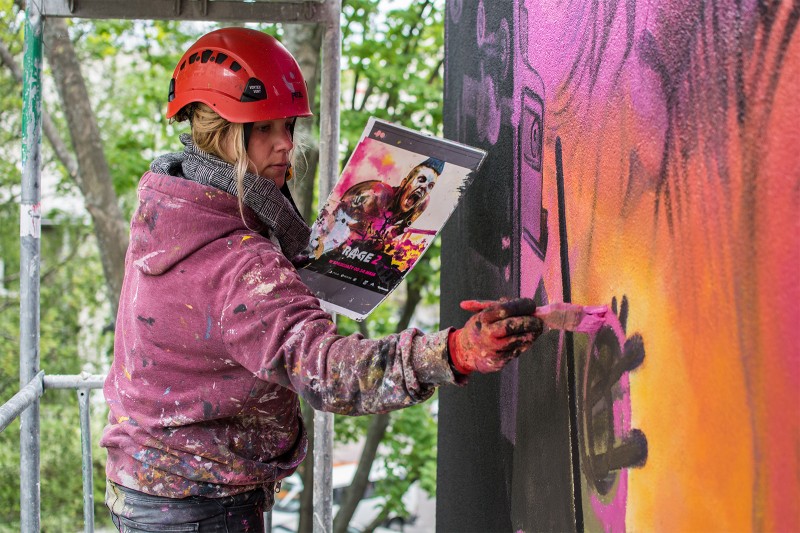Artist's painting mural commisioned from Cenega brand in Warsaw | Rage 2 | Portfolio