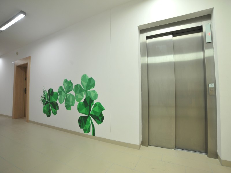 Clover on the wall inside building Residential Nowe Zamienie in Warsaw | Residential Nowe Zamienie | Portfolio