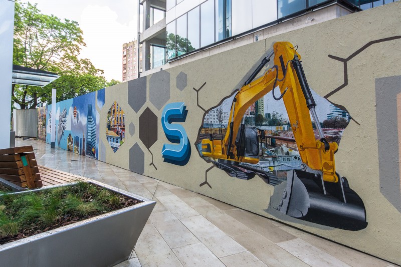 Malowanie artystyczne ogrodzenia dla klienta Skanska przy budynku SPARK | SPARK | Portfolio