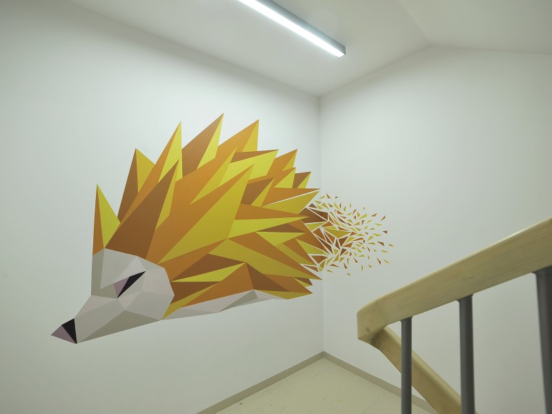 Creative mural on stairway wall in Warsaw Residential Nowe Zamienie | Residential Nowe Zamienie | Portfolio