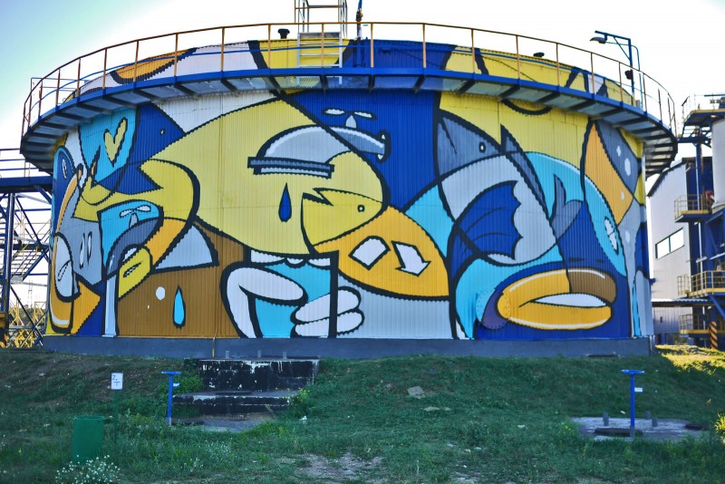 Oczyszczalnia Ścieków WARTA w Częstochowie mural | wielkoformatowe malowanie oczyszczalni ścieków WARTA | Portfolio