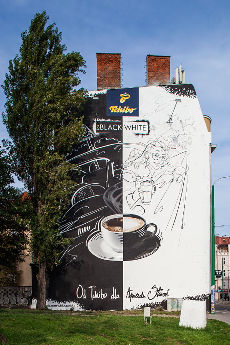 Tchibo Black and White malowidło na ścianie w Poznaniu | Kampania reklamowa namalowana dla Tchibo | Portfolio